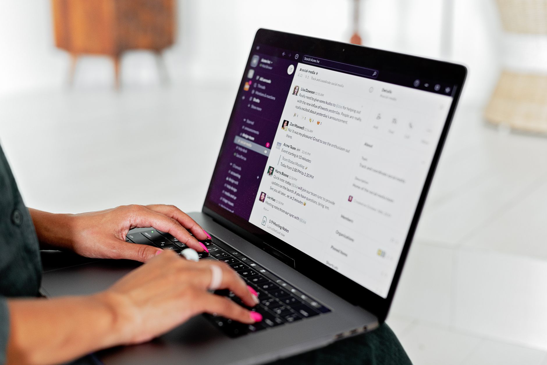 Person typing on laptop with ChatGPT chat interface open